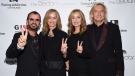 Sir Ringo Starr, from left, his wife Barbara Bach, honorees Marjorie Bach Walsh and husband Joe Walsh pose together at the Facing Addiction with NCADD (National Council on Alcoholism and Drug Dependence) gala at the Rainbow Room on Oct. 8, 2018, in New York. (Evan Agostini/Invision/AP)