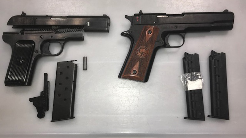 RCMP seized two guns at the Edmonton International Airport after a flyer tried to take them on the plane. 