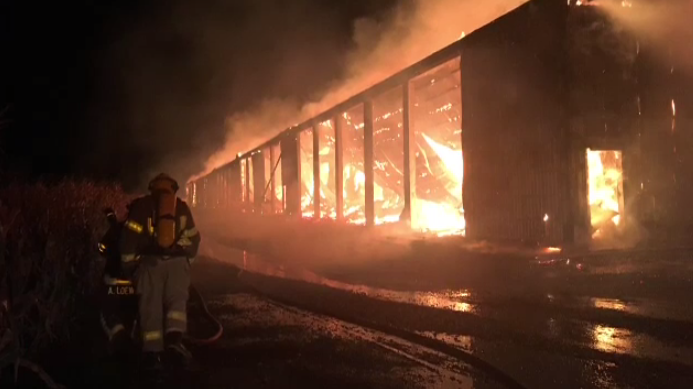 A hay barn on fire in Aylmer