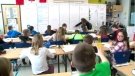 This file photo shows a Saskatchewan classroom full of students.