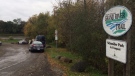 Police cruisers on-scene after a deceased male was reported on a Kitchener walking trail.