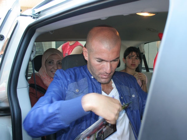 With his wife and children in tow, French soccer star Zinedine Zidane arrives at a soccer camp in East Vancouver on Friday. (Britannia Secondary School) July 5th, 2009.