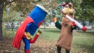 Two costumed figures, including Tokaroo, right, mark the first day of legalization of cannabis across Canada in a Toronto park on Wednesday, October 17, 2018. Mascot maker Mark Scott says he will not buckle to legal threats from Ontario's public broadcaster over his pothead parody of the beloved children's TV character Polkaroo. (THE CANADIAN PRESS/Chris Young)