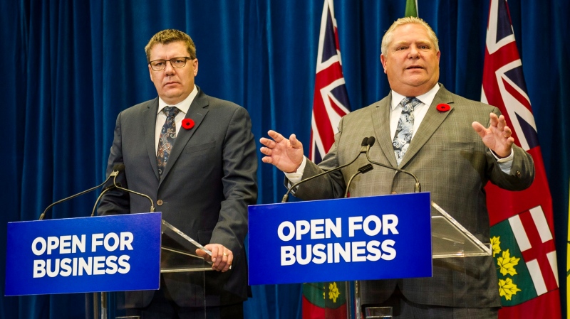 Sask. Premier Scott Moe (left) and Ont. Premier Doug Ford hold a joint news conference after a meeting at Queen's Park in Toronto on Monday, Oct. 29, 2018. (THE CANADIAN PRESS/Christopher Katsarov)