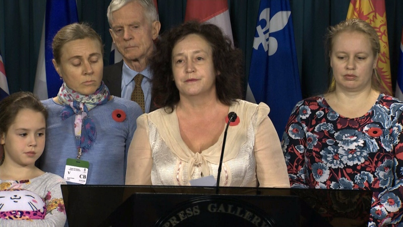 Dr. Elena Musikhina at a news conference in Ottawa