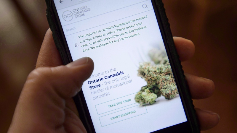 The Ontario Cannabis Store website is pictured on a mobile phone Ottawa on Thursday, Oct. 18, 2018.  (THE CANADIAN PRESS/Sean Kilpatrick)
