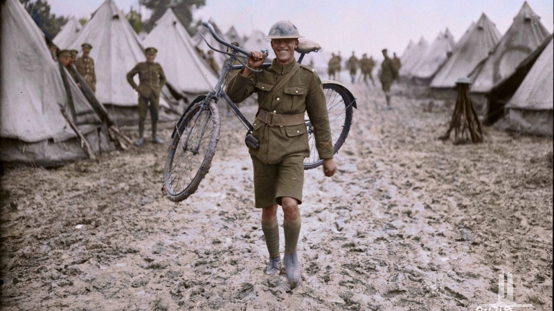 A Canadian messenger carries his 'horse,' August, 1917. (Vimy Foundation / Library and Archives Canada)