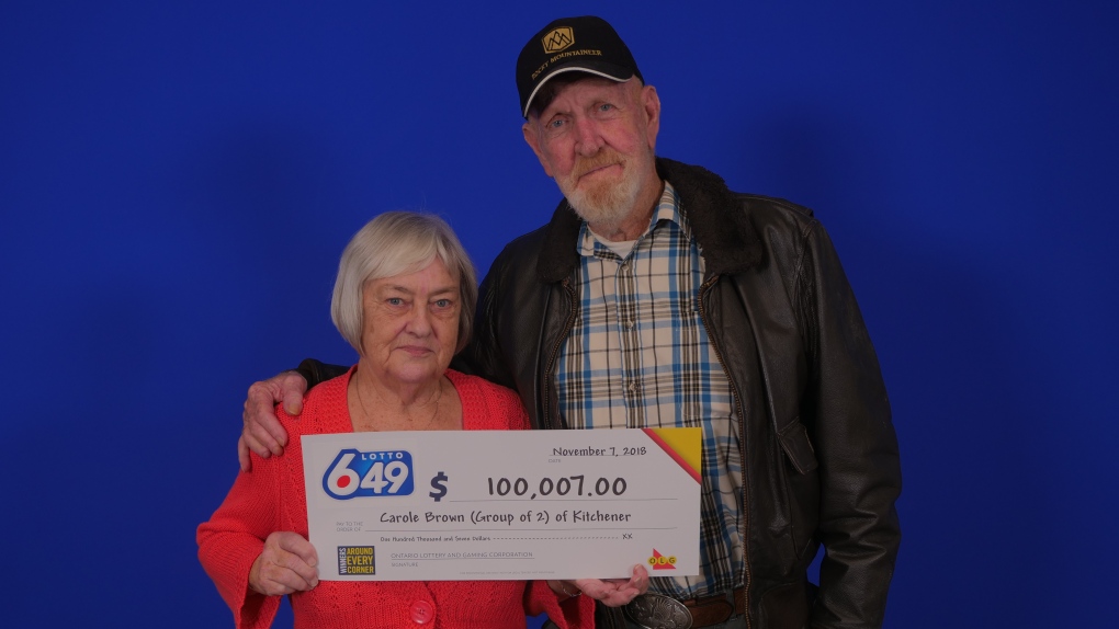 Carole Brown and James Cox with their winnings