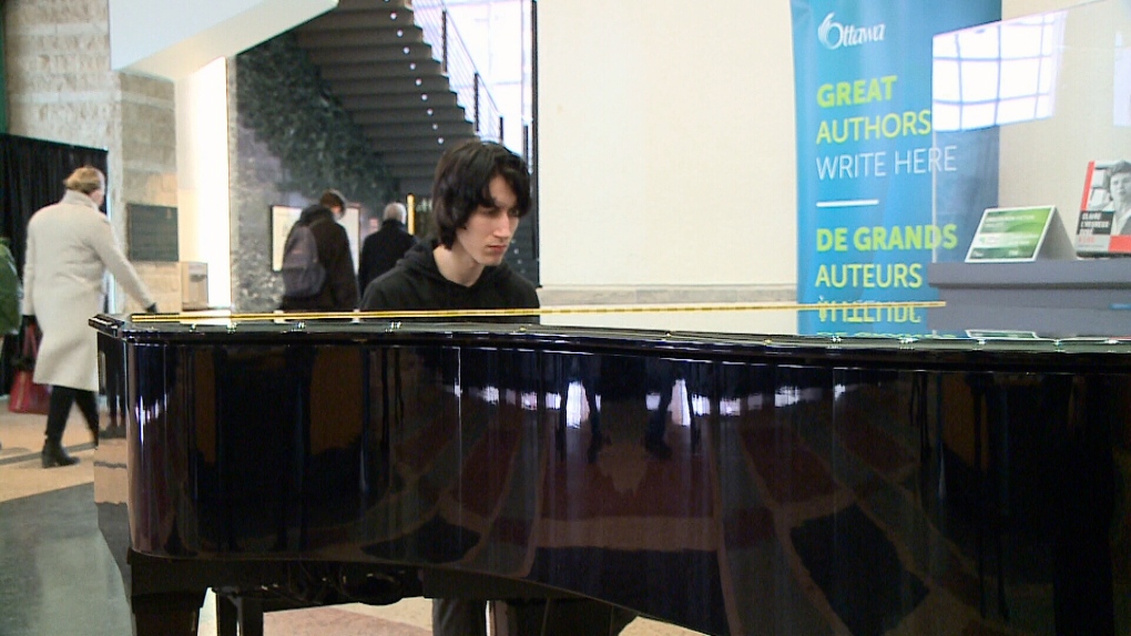 Lisgar student Aidan Prince playing piano.