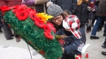 Poppies are placed on a wreath at a cenotaph during a Remembrance Day service at Vimy Ridge Memorial Park in Winnipeg, Sunday, November 11, 2018. (THE CANADIAN PRESS/John Woods)