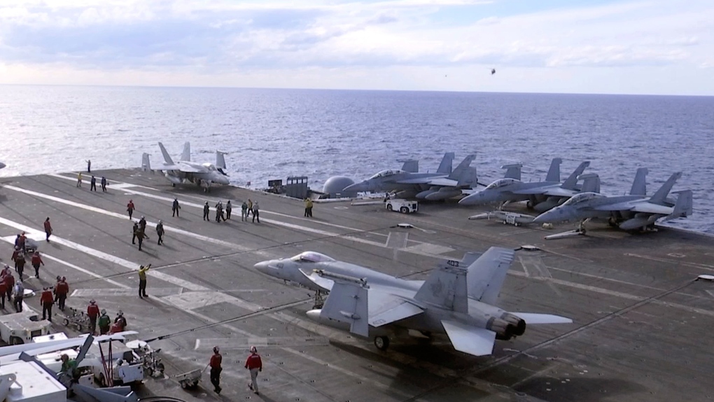 F-18 fighter jets on the USS Ronald Reagan