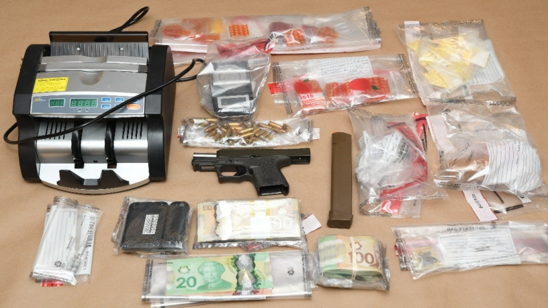 Officials seized, drugs, cash and a loaded gun from a location on Kathleen Avenue on Friday, Nov. 9, 2018. (Source: London Police Service)