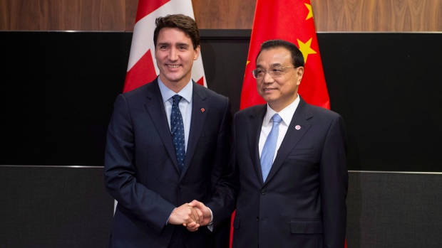 Image result for Trudeau sits down with China's premier at Asian summit over free trade future