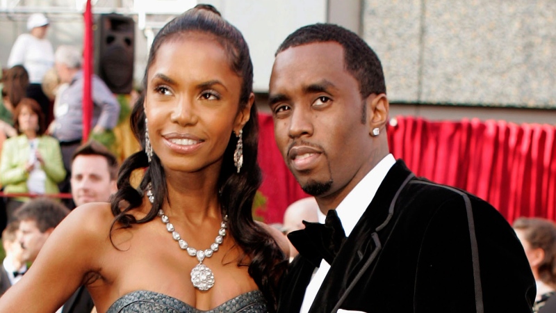 In a Feb. 27, 2005 file photo, Sean 'P. Diddy' Combs arrives with date, Kim Porter, for the 77th Academy Awards in Los Angeles. (AP / Amy Sancetta, File)