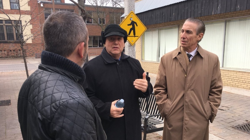 DWBIA chair Larry Horwitz (middle) takes new consultant Peter Bellmio (right) on a tour of downtown Windsor on November 19, 2018. ( Chris Campbell / CTV Windsor )