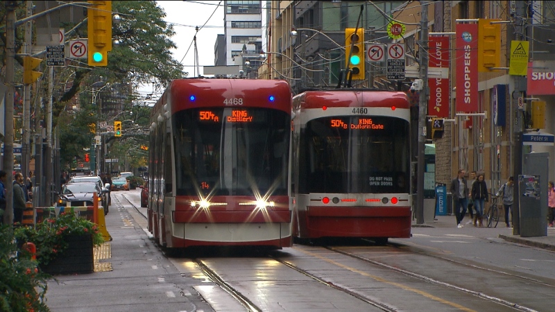 Two streetcars are seen on King Street in downtown Toronto in this undated file photo.