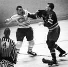Montreal Canadiens' John Ferguson fights with New York Rangers' Bob Nevin in this 1964 file photo in New York. (CP PICTURE ARCHIVE) 