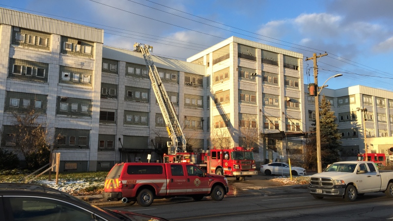 Fire crews work at the scene of a fire at the old McCormick/Beta Brands factory in east London, Ont. on Tuesday, Nov. 20, 2018. (Bryan Bicknell / CTV London)