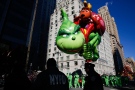 The Grinch balloon floats over Central Park West during the 92nd annual Macy's Thanksgiving Day Parade in New York, Thursday, Nov. 22, 2018. (AP Photo/Eduardo Munoz Alvarez)