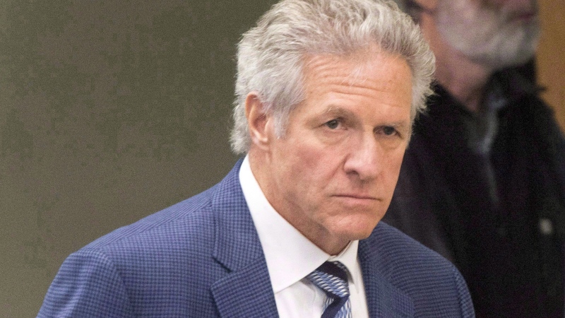 Former construction magnate Tony Accurso walks to the courtroom at his trial in Laval, Quebec on Monday, November 13, 2017. (THE CANADIAN PRESS/Ryan Remiorz)