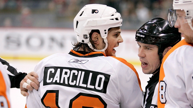 Philadelphia Flyers left wing Daniel Carcillo is restrained by referee Ian Walsh (29) in the first period against the Minnesota Wild during a preseason NHL hockey game in St. Paul, Minn., on September 25, 2010. Daniel Carcillo spoke out on Saturday night about his experience with hazing while a member of the OHL's Sarnia Sting, detailing how he feels Canada's hockey culture needs to change. THE CANADIAN PRESS/AP, Andy King