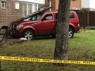 One person has critical injuries after a vehicle hit a house on Hawthorne Drive.  (Alana Hadadean / CTV Windsor )