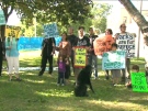 Protesters rally outside Moss Park, speaking out against dump sites set up in neighbourhood parks.