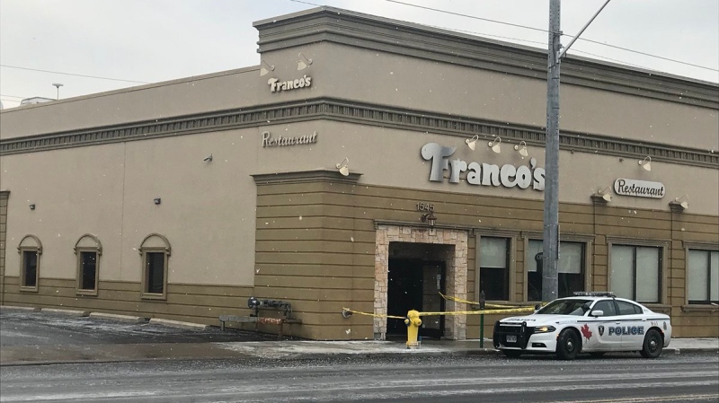 Windsor police remain on scene after a fire at Franco's Restaurant on Tecumseh Road in Windsor, Ont., on Friday, Dec. 7, 2018. (Angelo Aversa / CTV Windsor)