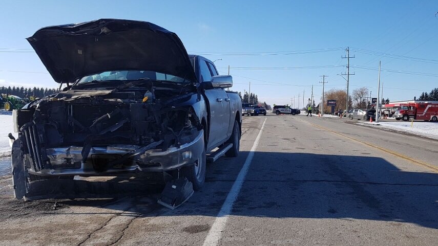A damaged pickup truck after a crash