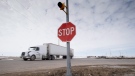 The stop sign on highway 335 is seen at the intersection of highway 35 near Tisdale, Sask., Tuesday, April, 10, 2018. THE CANADIAN PRESS/Jonathan Hayward