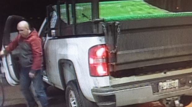 A man getting out of a pickup reported stolen