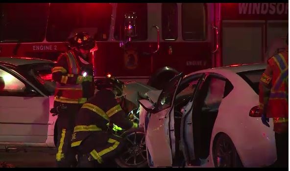 Emergency personnel on scene of a crash on Wyandotte Street East near St. Luke Road on Friday, Dec. 21, 2018.
