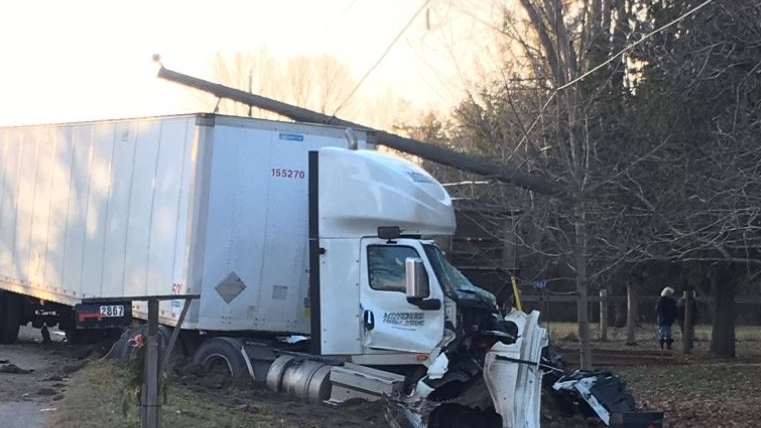 A transport truck sustained damage after hitting a transformer near Dorchester, Ont. on Thursday, Dec. 27, 2018. (Celine Moreau / CTV London) 