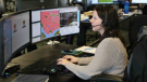 Heather Andrews, a 911 operator, is seen in an undated image provided by E-Comm. 