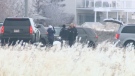 CPS members on McKnight Boulevard, between 68 St and Stoney Trail NE, following the fatal shooting of a suspect on Christmas Day 