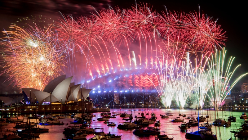 Fireworks explode over the Sydney Harbour during New Year's Eve celebrations in Sydney, Tuesday, Jan. 1, 2019. (Brendan Esposito/AAP via AP)