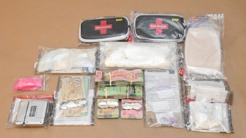 Drugs, cash and other items seized in a raid on Jan. 2, 2019, are seen in this photo released by the London Police Service.
