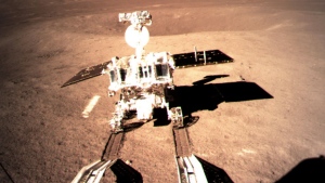 In this photo provided on Thursday, Jan. 3, 2019, by China National Space Administration via Xinhua News Agency, Yutu-2, China's lunar rover, leaves wheel marks after leaving the lander that touched down on the surface of the far side of the moon. A Chinese spacecraft on Thursday, Jan. 3, made the first-ever landing on the far side of the moon, state media said. The lunar explorer Chang'e 4 touched down at 10:26 a.m., China Central Television said in a brief announcement at the top of its noon news broadcast. (China National Space Administration/Xinhua News Agency via AP)