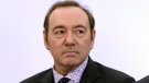 Actor Kevin Spacey stands in district court during arraignment on a charge of indecent assault and battery on Monday, Jan. 7, 2019, in Nantucket, Mass. The Oscar-winning actor is accused of groping the teenage son of a former Boston TV anchor in 2016 in the crowded bar at the Club Car in Nantucket. (Nicole Harnishfeger/The Inquirer and Mirror via AP, Pool)