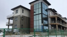 Glasshouse Condos in Regina's east end remain unfinished. (Taylor Rattray/CTV Regina)