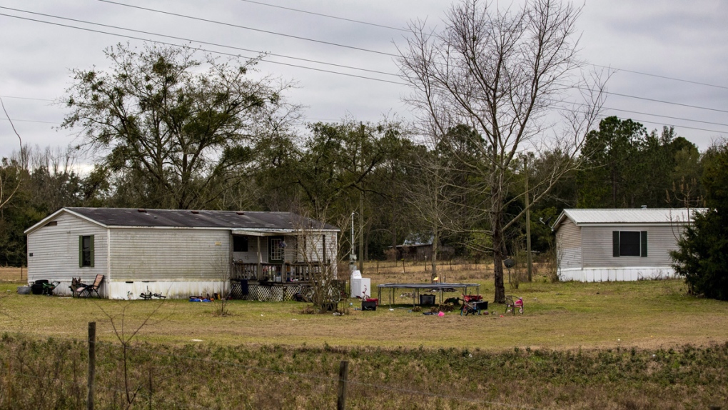 The home and yard in Suwannee County, Fla.
