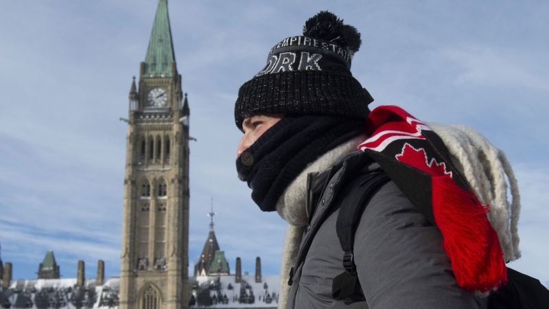 A man makes his way onto Parliament Hill Monday January 21, 2019 in Ottawa. THE CANADIAN PRESS/Adrian Wyld
