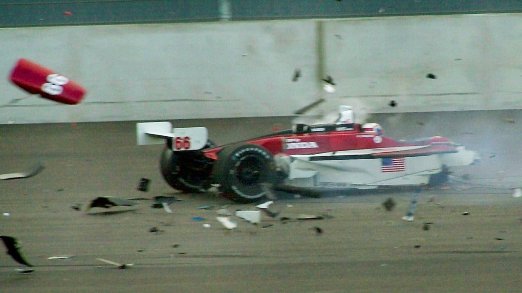 Alex Zanardi's car breaks up after it crashed