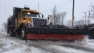 A snow plow works to clear the road in Windsor, Ont., on Monday, Jan. 28, 2019. (Chris Campbell / CTV Windsor)