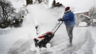 A woman uses a snowblower to dig out from the snow after Toronto and most of southern Ontario got hit by a storm in Toronto on Tuesday, January 29, 2019. THE CANADIAN PRESS/Nathan Denette