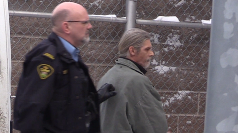 Cameron Gardiner, 57, is escorted out of the Collingwood courthouse on Tuesday, Jan. 29, 2019 (CTV News/Roger Klein)
