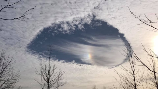 Many British Columbians looked to the sky Monday and saw massive holes seemingly 'punched out' of the cloud cover. Here are a few pictures of the weather phenomenon known as 'fallstreak holes.'