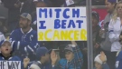 Brock Chessell, a 12-year-old cancer survivor from St. Marys, Ont. holds up a sign at a Leafs game in Toronto, Ont. on Monday, Feb. 4, 2019. 
