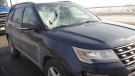 A large piece of ice 40 struck a westbound passenger vehicle causing significant damage to the front windshield. (Courtesy Chatham-Kent OPP)