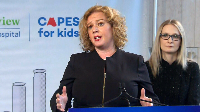 Lisa MacLeod stands with Amy Fee to make an announcement on funding for autism programs. 